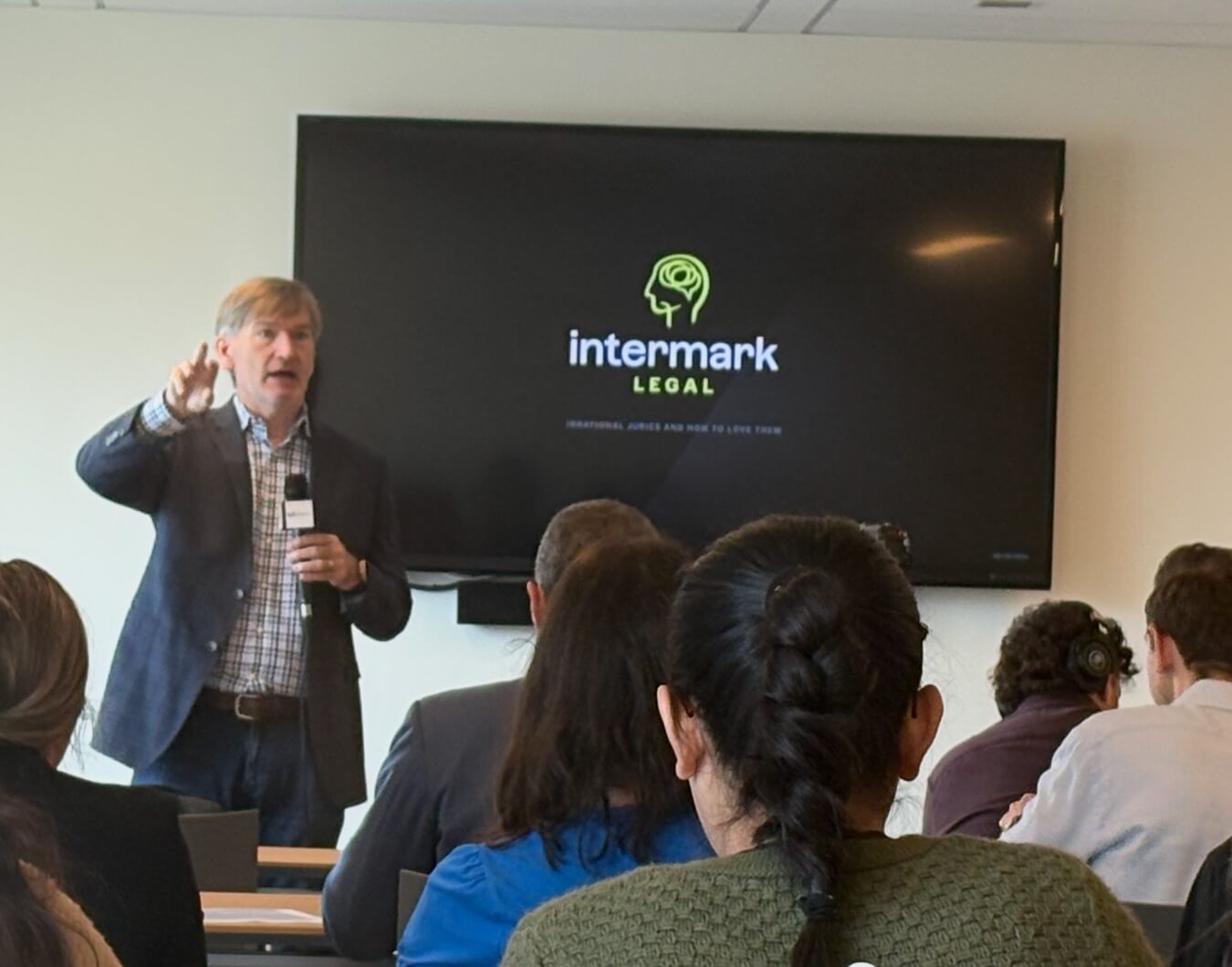 Jake McKenzie speaking at an Intermark Legal session